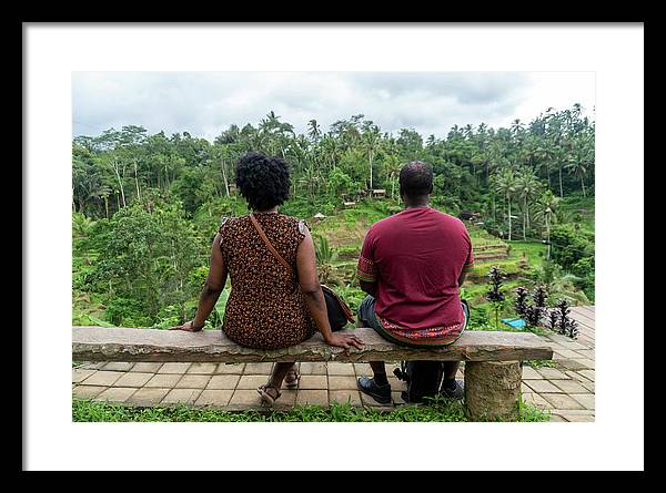 African American Family sitting on stone bench - Framed Print