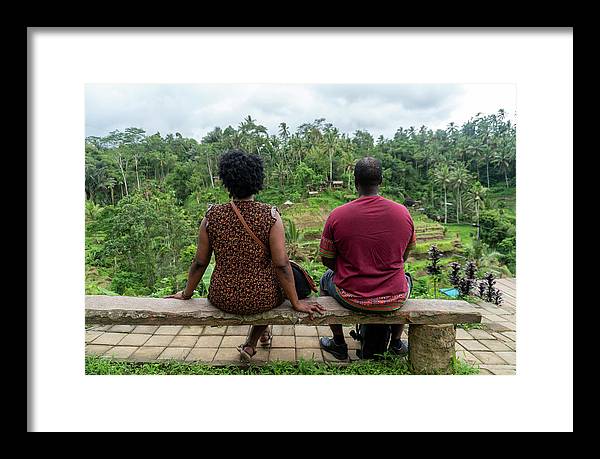 African American Family sitting on stone bench - Framed Print