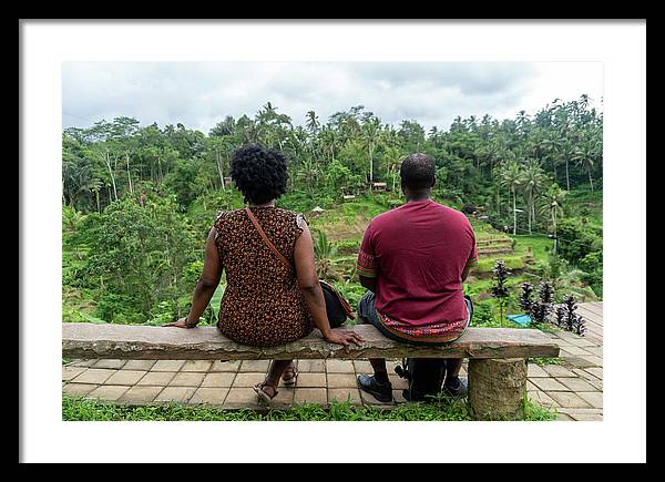 African American Family sitting on stone bench - Framed Print