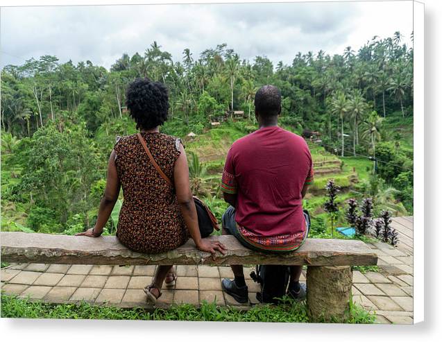 African American Family sitting on stone bench - Canvas Print